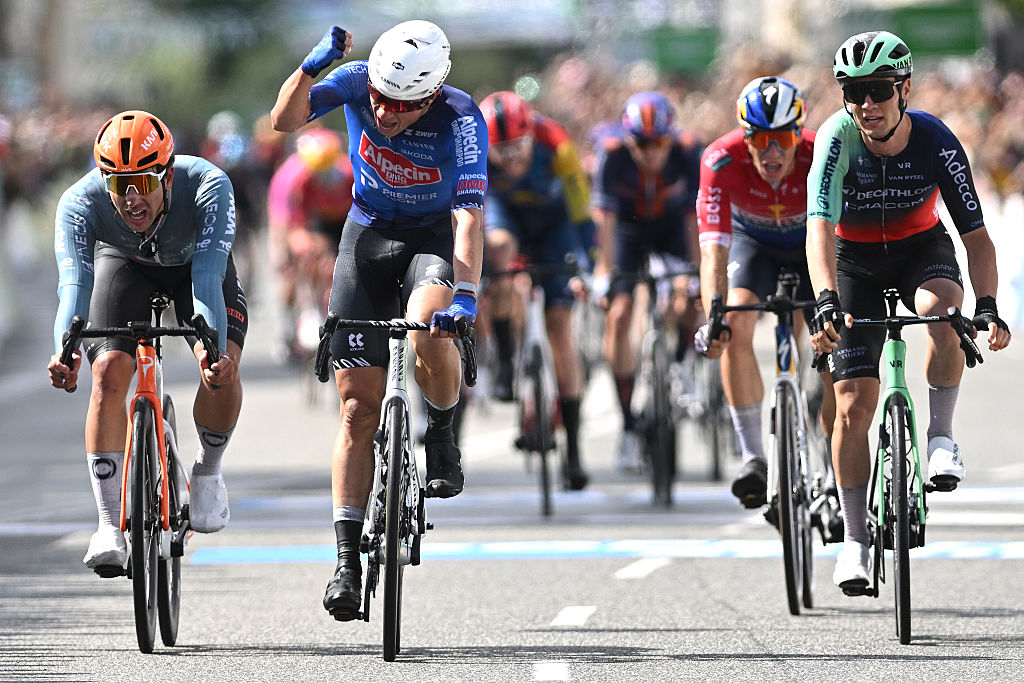 COPENHAGEN, DENMARK - JUNE 14: Jasper Philipsen of Belgium and Team Alpecin-Premier Tech (C) celebrates at finish line as race winner ahead of (L-R) Sam Welsford of Australia and Netcompany INEOS Cycling Team and Tobias Lund Andresen of Denmark and Team Decathlon CMA CGM during the 2nd Copenhagen Sprint 2026 - Men's Elite a 228.2km one day race from Roskilde to Copenhagen / #UCIWT / on June 14, 2026 in Copenhagen, Denmark. (Photo by Luc Claessen/Getty Images)