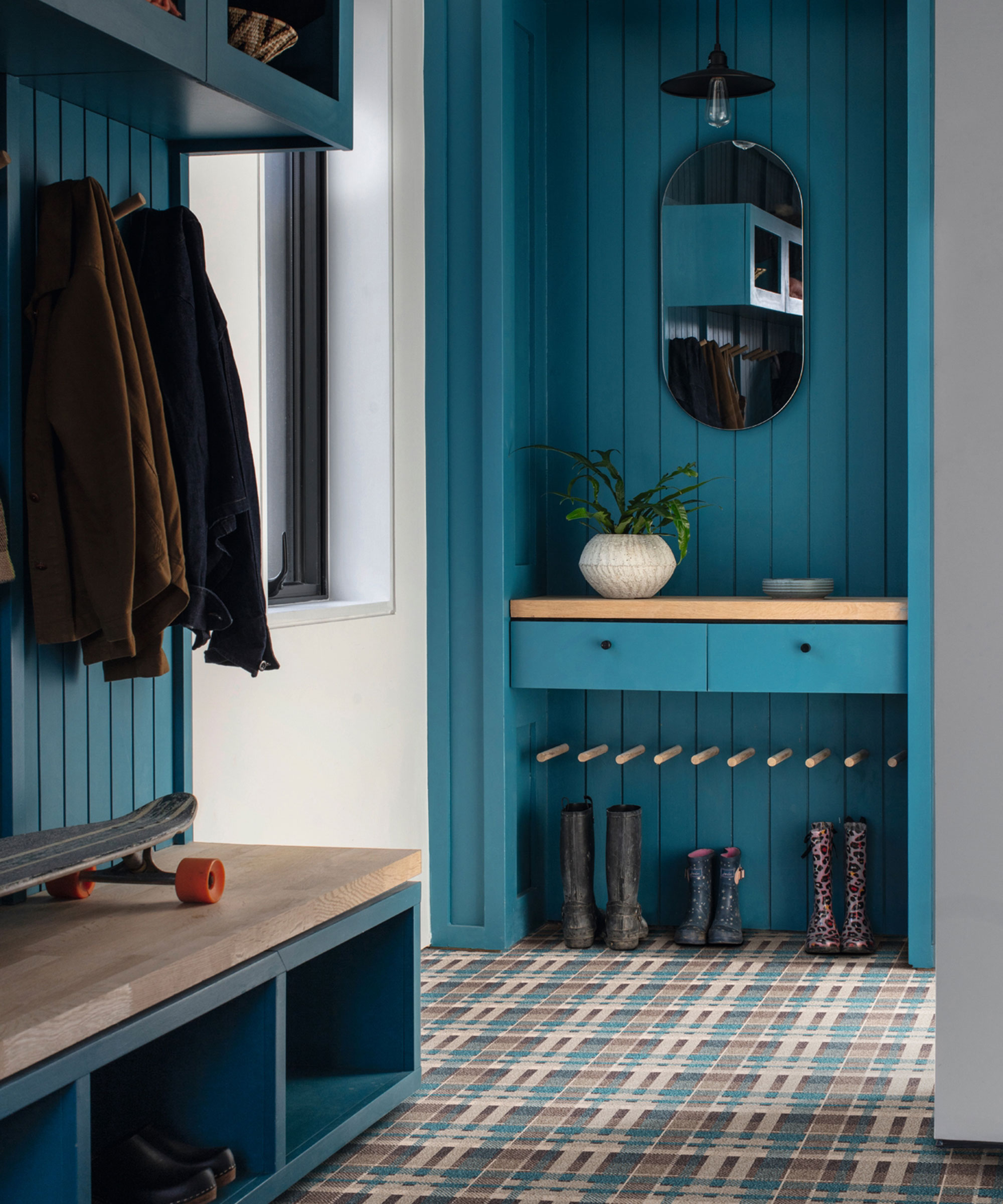 blue boot room with tartan carpet