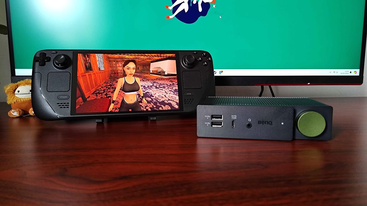 BenQ Be Creatus sitting next to Steam Deck with Tomb Raider Trilogy Remastered gameplay on screen