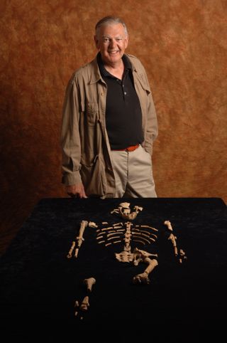 Paleoanthropologist Donald Johanson with a cast of the Lucy fossil he discovered in 1974.
