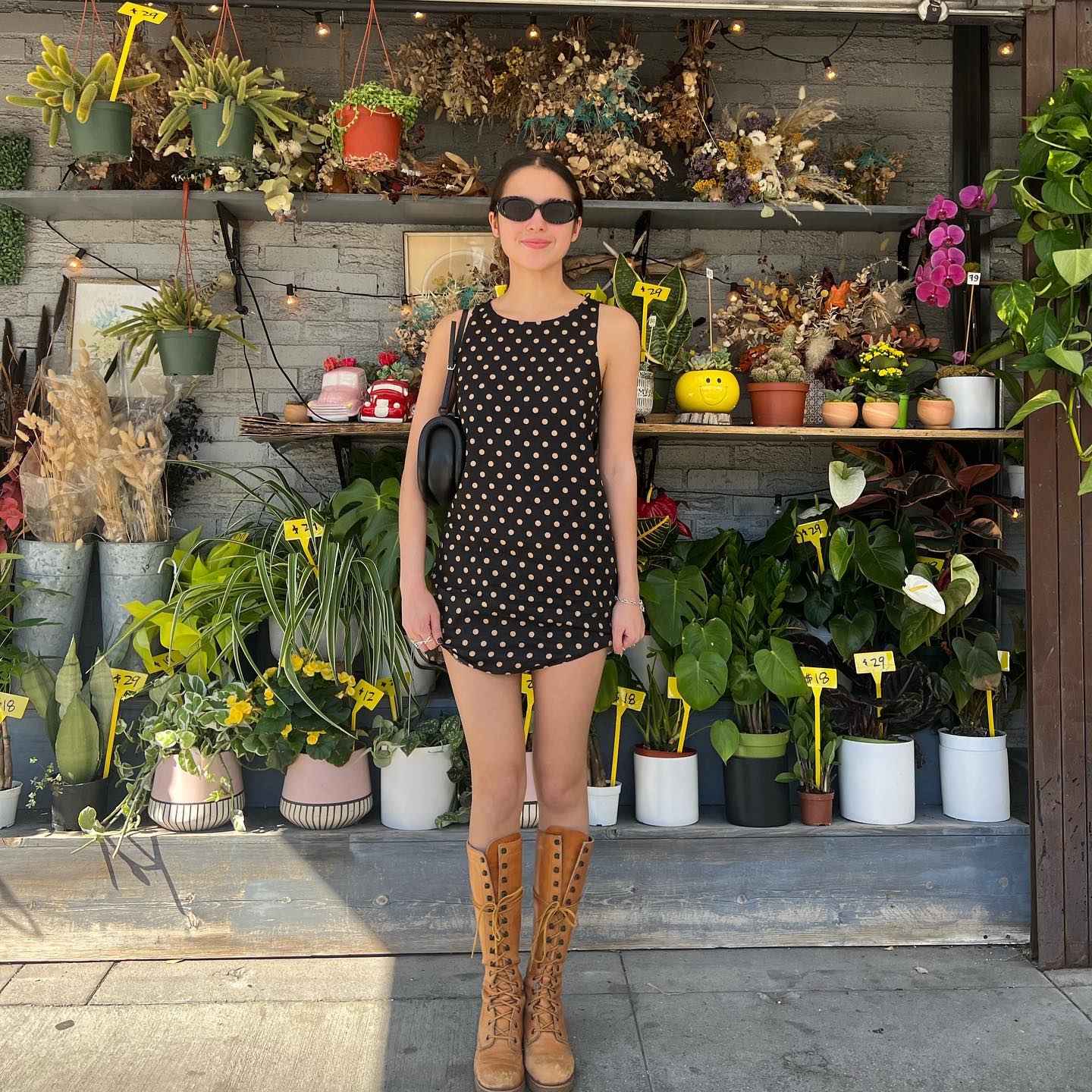 Olivia Rodrigo wearing a polka dot dress