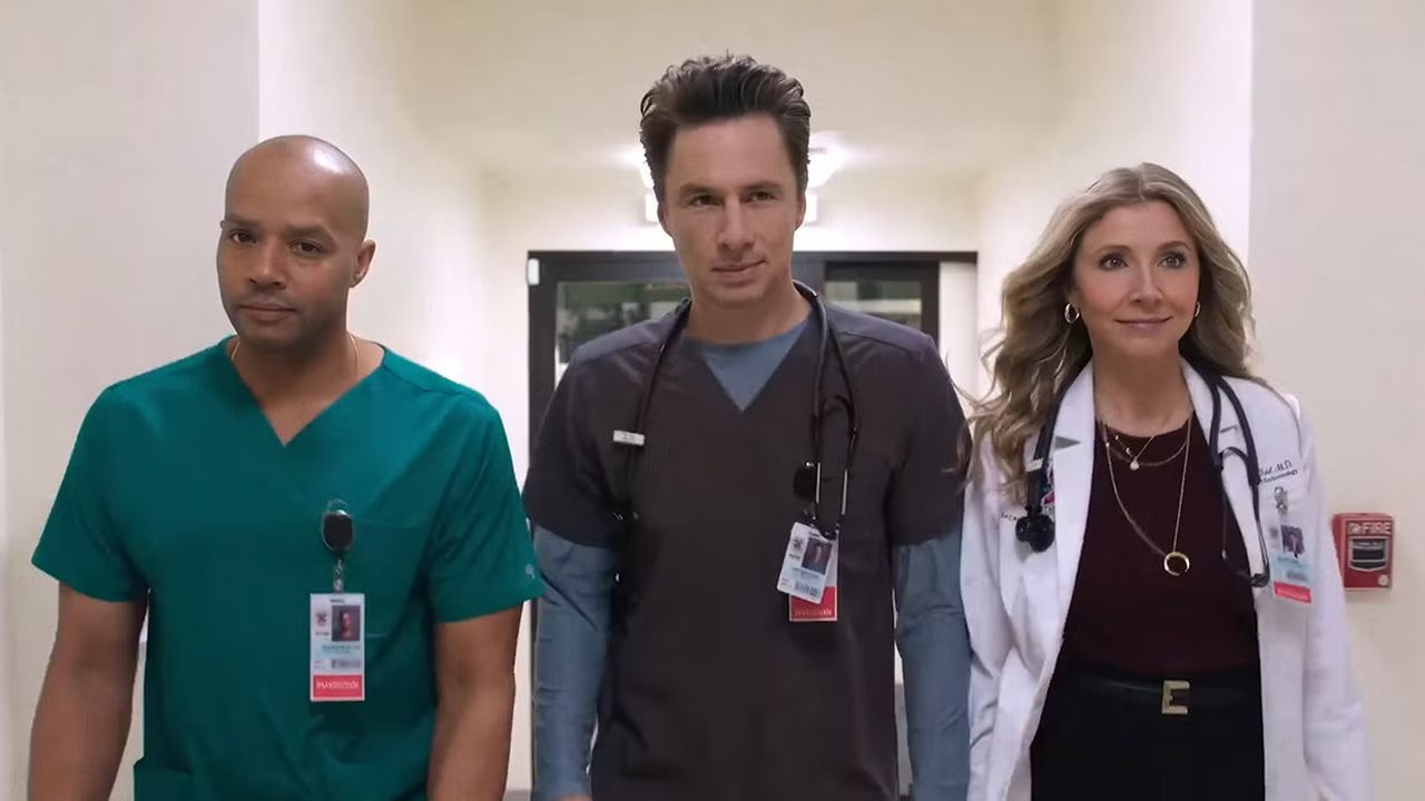 Turk, J.D., and Elliot walking down a hospital corridor in Scrubs season 10