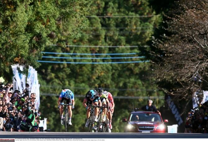 The riders sprint towards the line