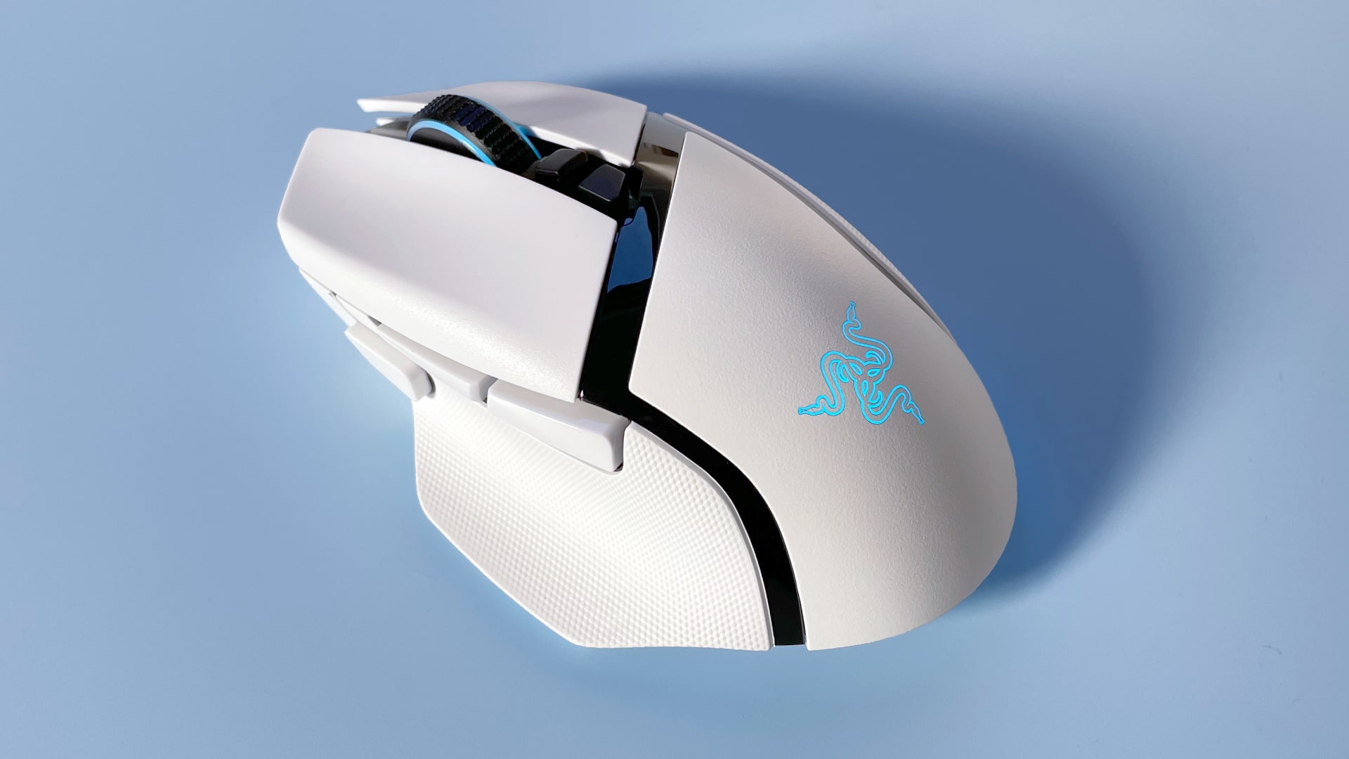 The Razer Basilisk V3 Pro 35K gaming mouse against a blue background.