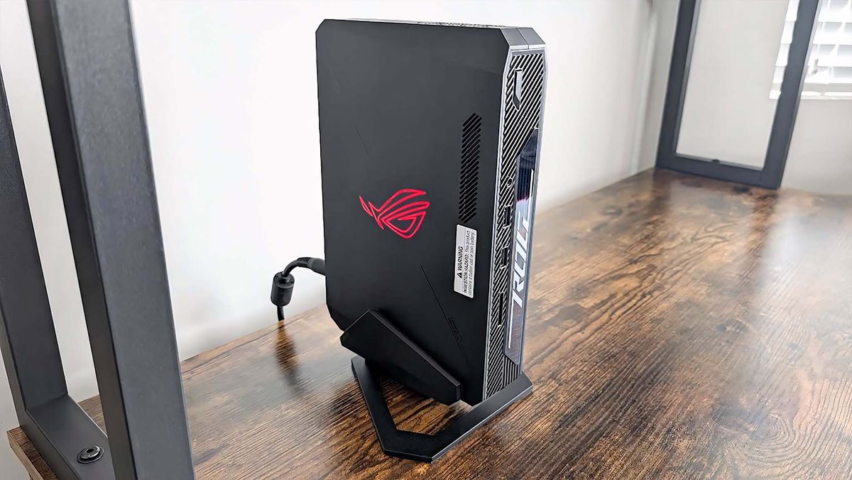 ASUS ROG NUC 970 Gaming Mini PC in stand.