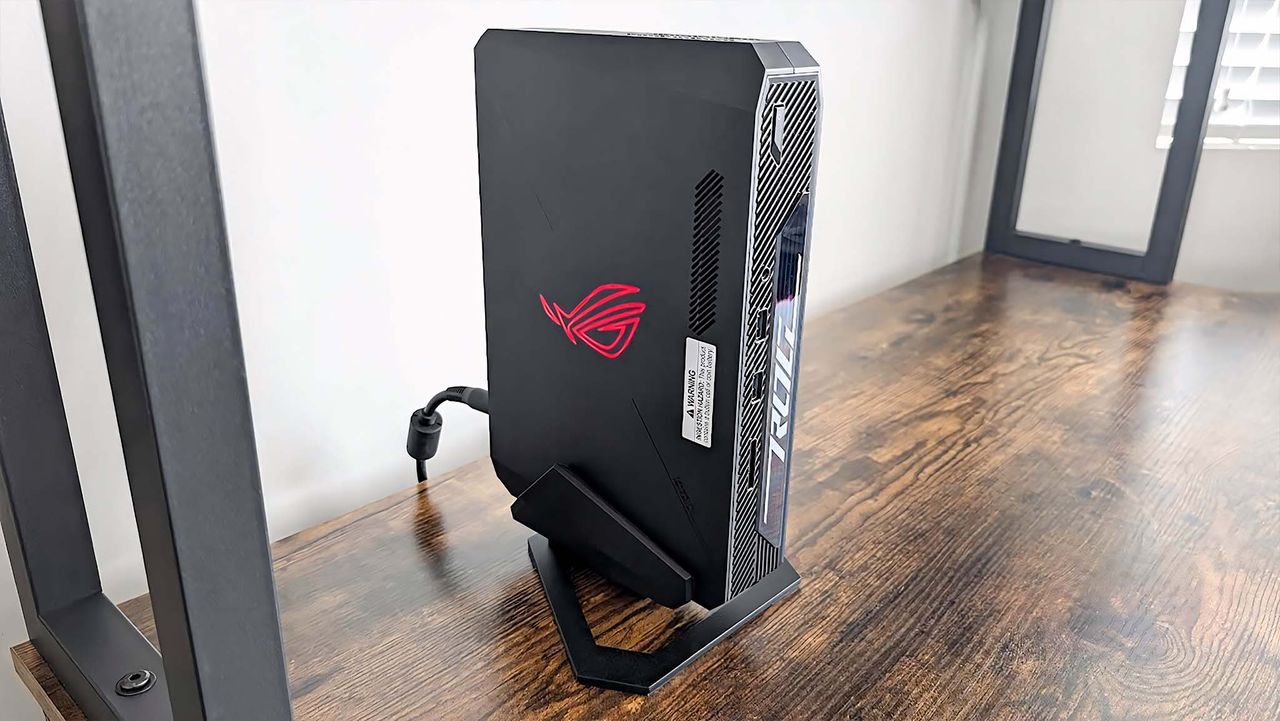 ASUS ROG NUC 970 Gaming Mini PC in stand.
