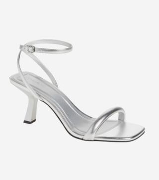 Image of silver strappy heels