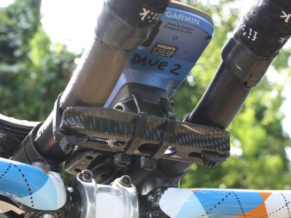 Team mechanics had previously used an array of zip ties to create a makeshift computer mount but this new revision - made from a scrapped bottle cage - is more secure.