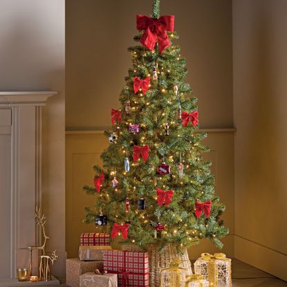 Aldi christmas tree covered in red bows