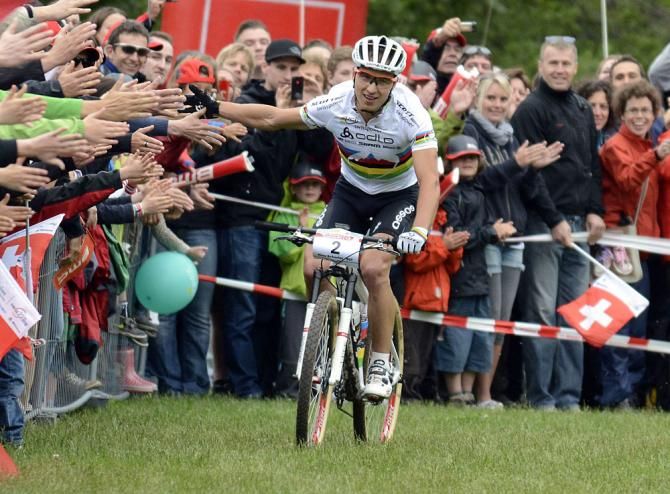 Nino Schurter (Switzerland) is congratulated by the crowd for his silver medal winning ride