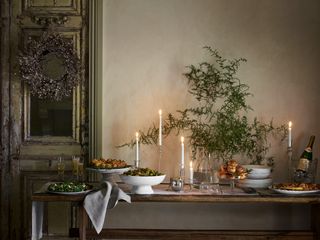 White Company side table laid with food for a dinner party