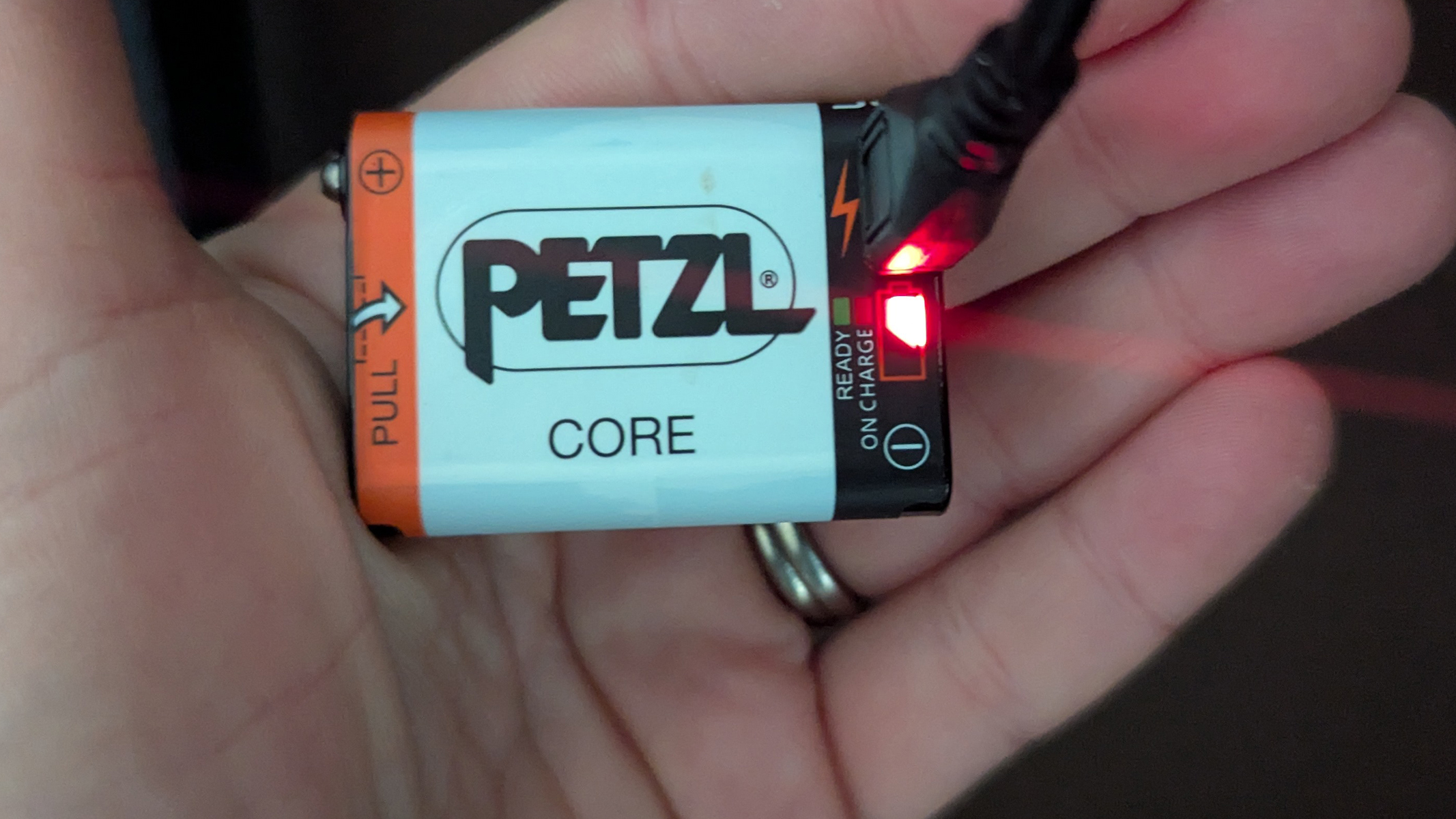 The Core battery plugged in and charging during review