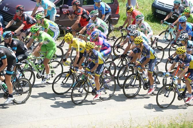 The peloton bided its time for the final climb