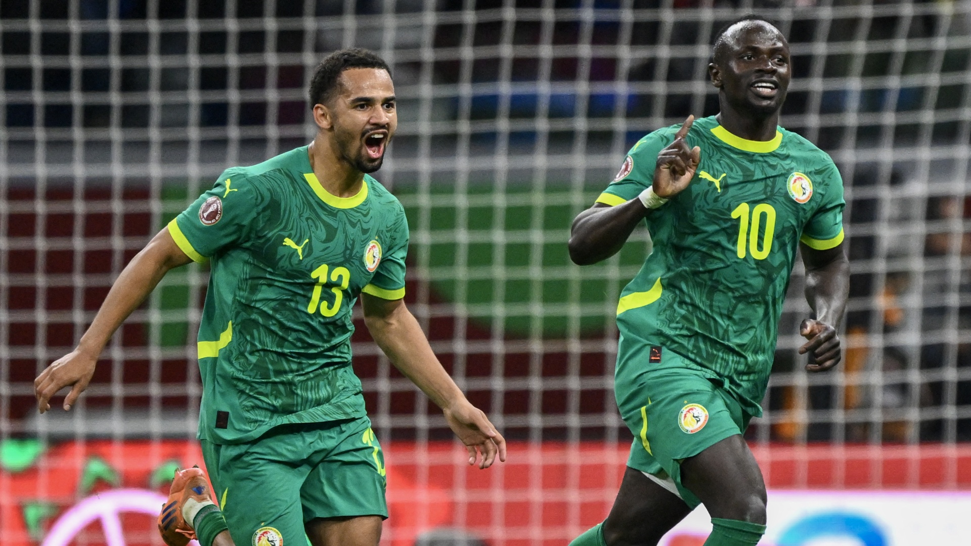 Senegal's Sadio Mane celebrating with Iliman Ndiaye at AFCON 2025/26