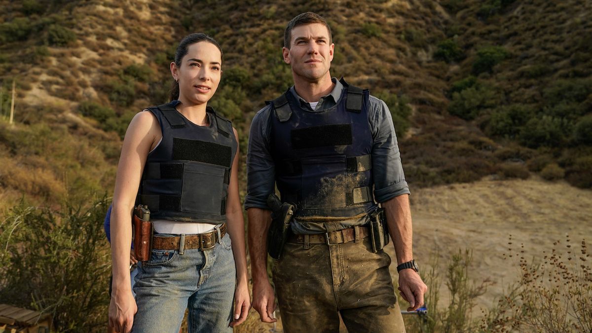 Gibbs and Lala wearing bulletproof vests while out in the field in NCIS: Origins