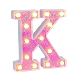 A pink sparkly 'K' light
