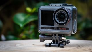 Image of the Akaso Brave 8 in its case with a GoPro style mount