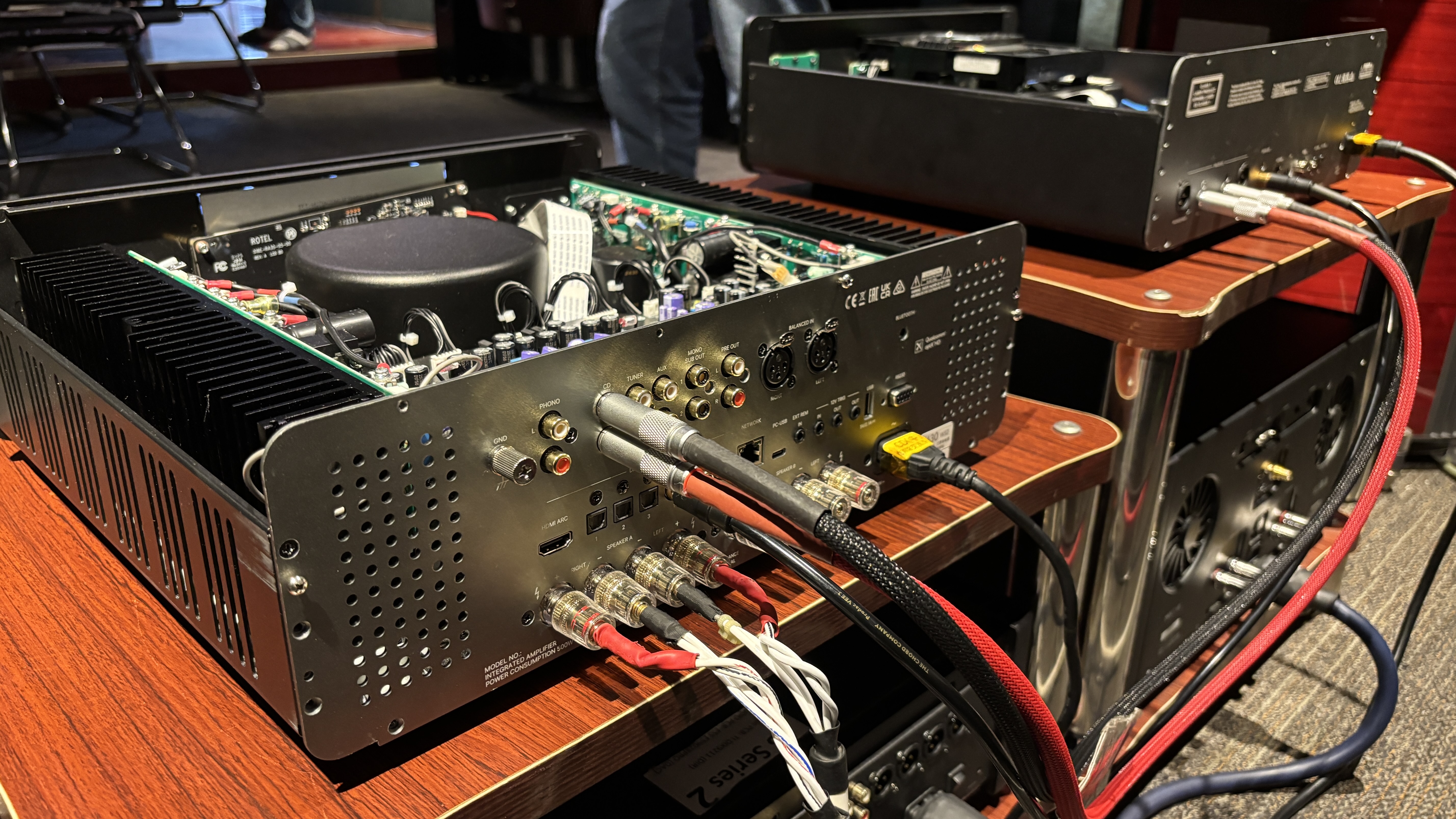 Rear of the Michi Prestige X430 integrated amplifier with various cables connected