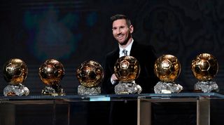 Lionel Messi poses with his Ballons d'Or after winning the award for the sixth time in 2019.