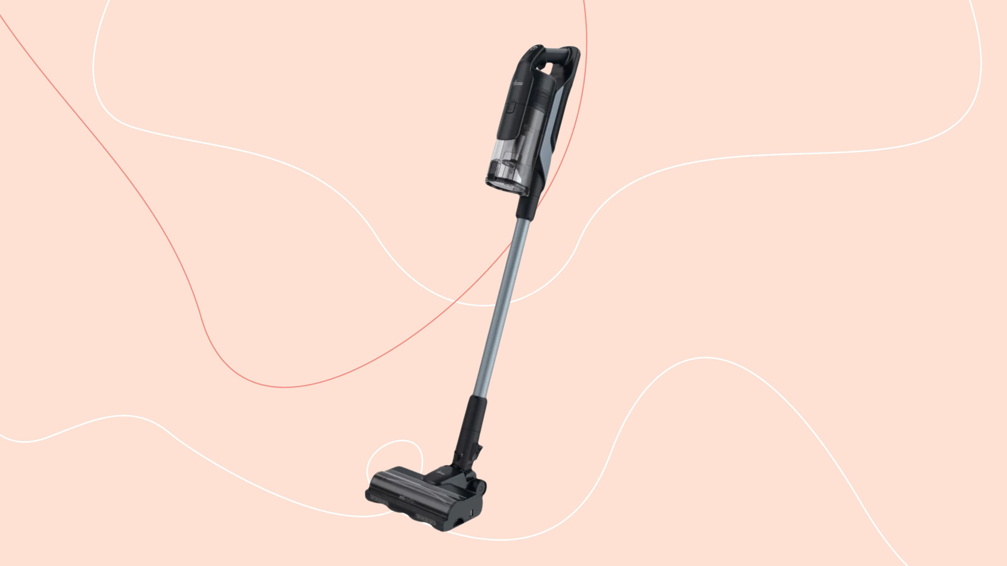 Hoover HF6 Turbo Sense Pet Cordless Vacuum on a pink background