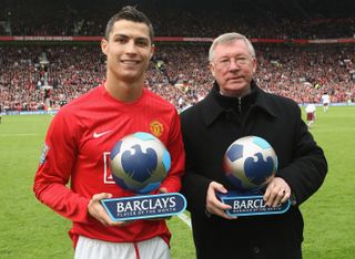 Manchester United pair Cristiano Ronaldo and Sir Alex Ferguson pose with the Player of the Month and Manager of the Month awards ahead of a game against Arsenal in April 2008.