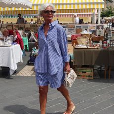 @greceghanem outfit photo in blue striped shirt and shorts set