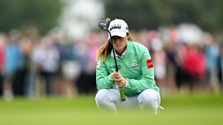 Leona Maguire lining up putt