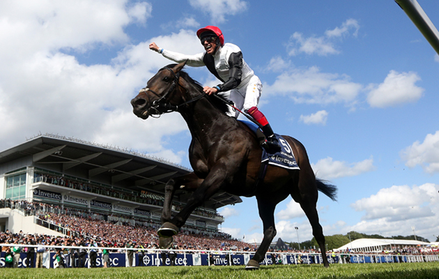 EPSOM, ENGLAND - JUNE 06: Frankie Dettori celebrates as he rides Golden Horn to win The Investec Derby at Epsom racecourse on June 06, 2015 in Epsom, England. (Photo by Charlie Crowhurst/Getty Images)