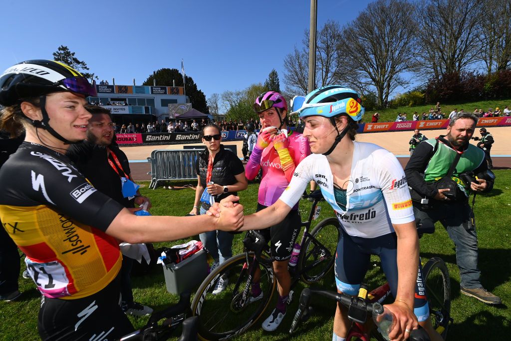 ROUBAIX FRANCE APRIL 16 LR Lotte Kopecky of Belgium Chantal Van Den Broek Blaak of Netherlands and Team SD Worx and Lucinda Brand of Netherlands and Team Trek Segafredo greet each other in the Roubaix Velodrome Vlodrome Andr Ptrieux during the 2nd ParisRoubaix 2022 Womens Elite a 1247km one day race from Denain to Roubaix ParisRoubaixFemmes ParisRoubaix on April 16 2022 in Roubaix France Photo by Tim de WaeleGetty Images