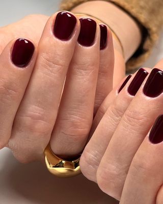 Short dark red nails