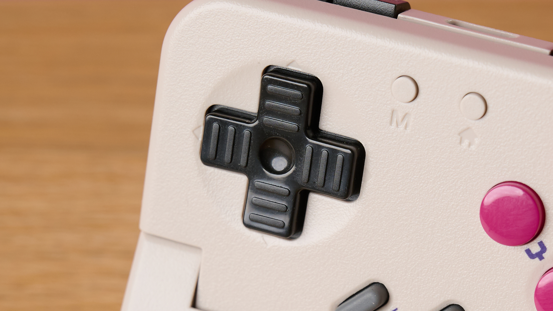 A closeup of the GameSir Pocket Taco's D-pad.