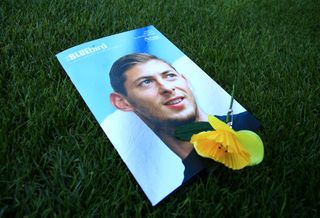 A view of the matchday programme with an image of Emiliano Sala on the cover