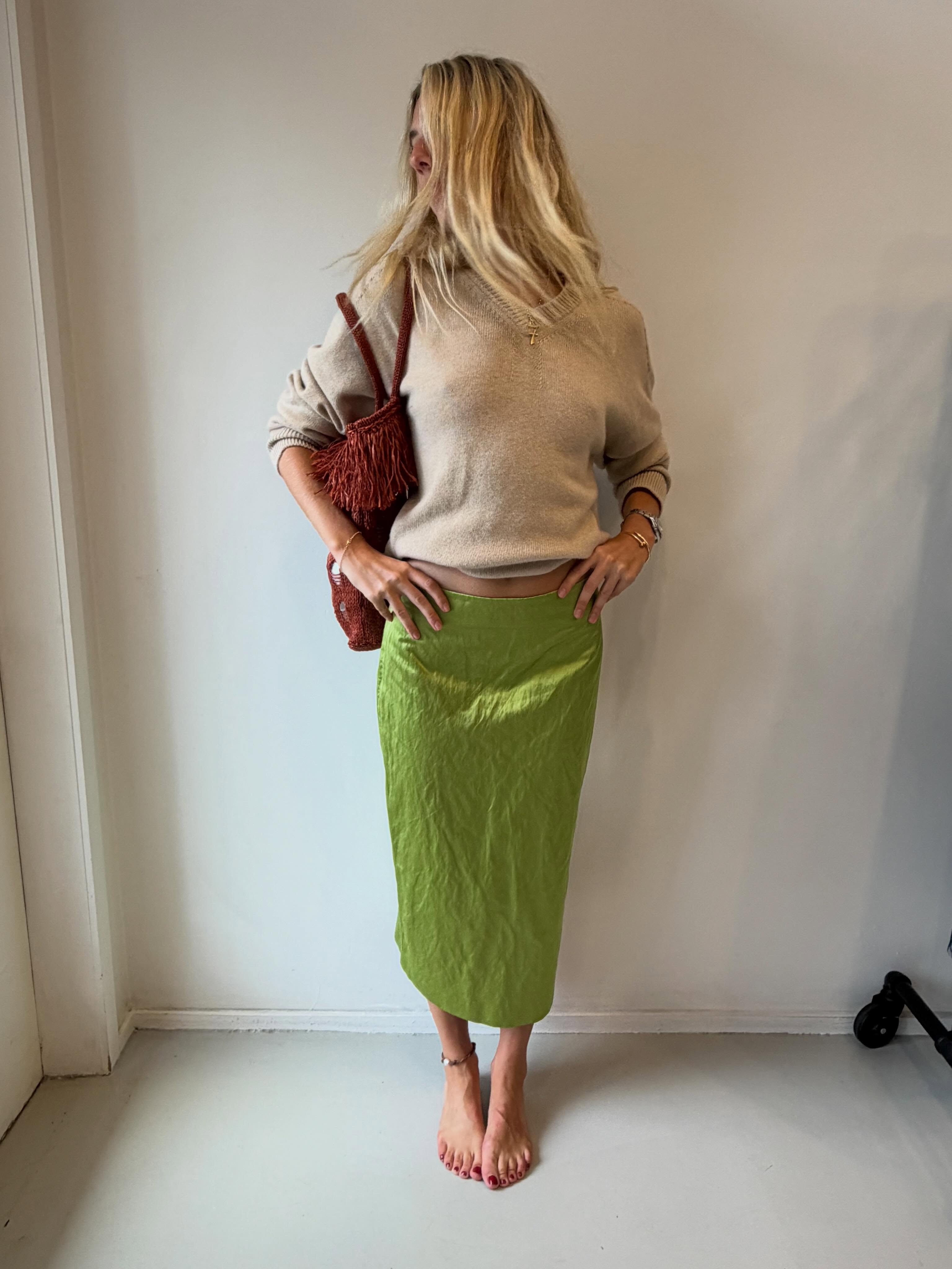 An image of a woman wearing early fall trendy outfit idea 2026