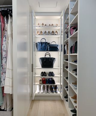 Large purses and shoes stored on shelving in walk-in closet, Neat Method