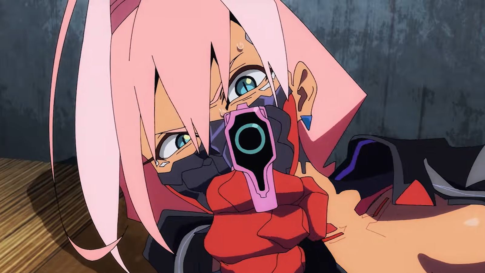 Cyborg woman with pink hair and open shirt pointing gun at camera.
