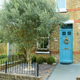 semi detached house exterior with blue painted front door
