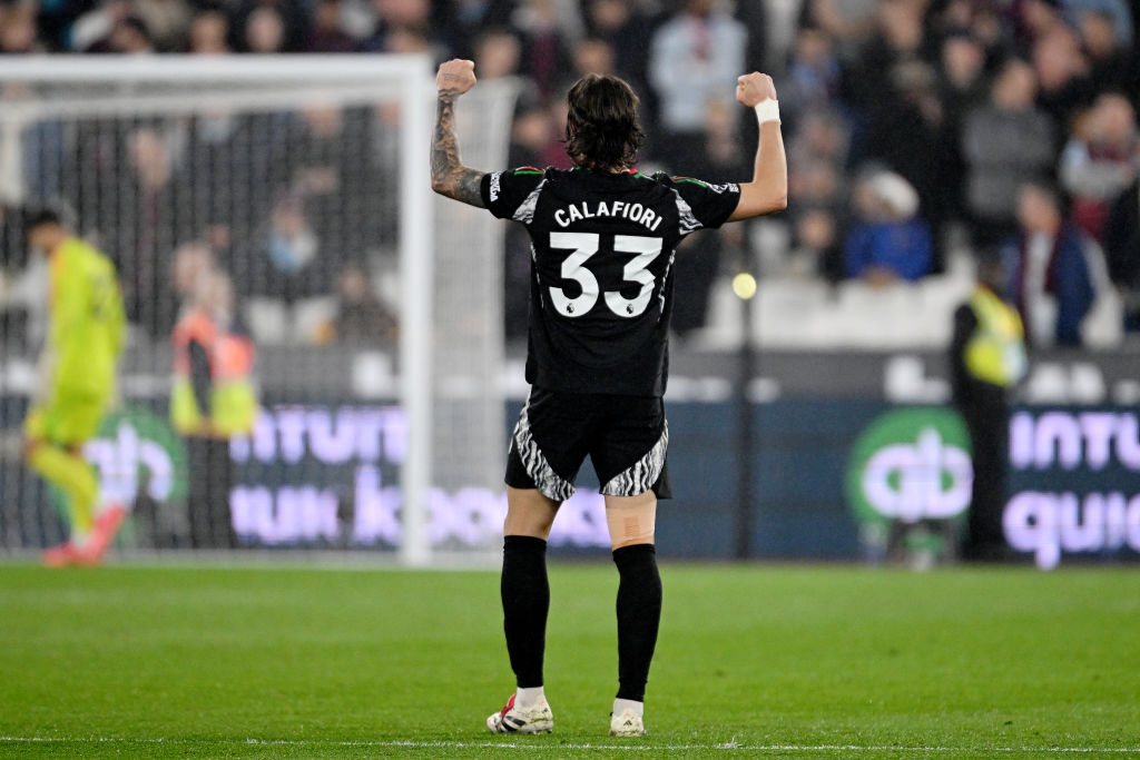 Riccardo Calafiori of Arsenal celebrates after Kai Havertz of Arsenal (not pictured) scores his team's fourth goal during the Premier League match between West Ham United FC and Arsenal FC at London Stadium on November 30, 2024 in London, England.