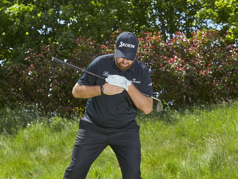 Shane-Lowry-downhill-chip