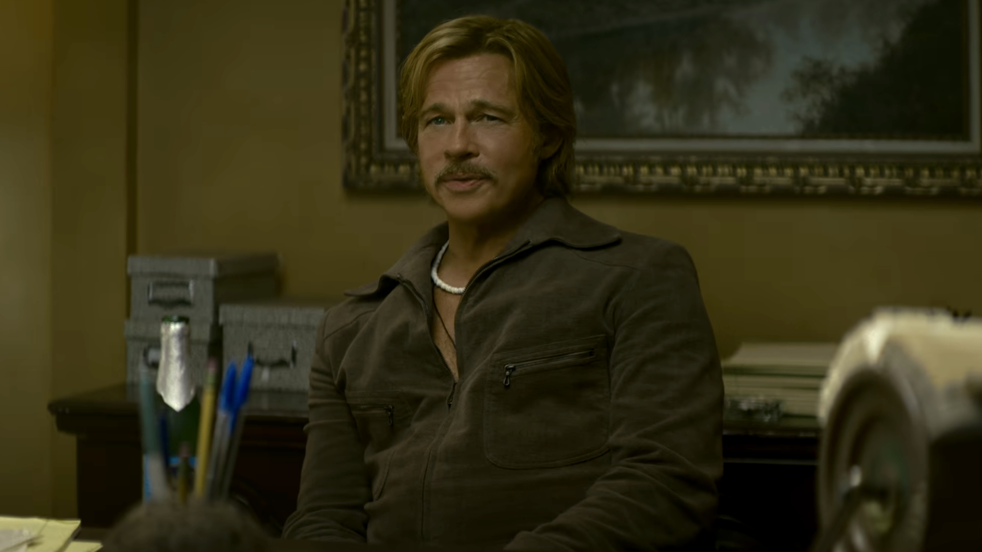 Cliff Booth (Brad Pitt) has a conversation about his past in The Further Mis-Adventures of Cliff Booth.