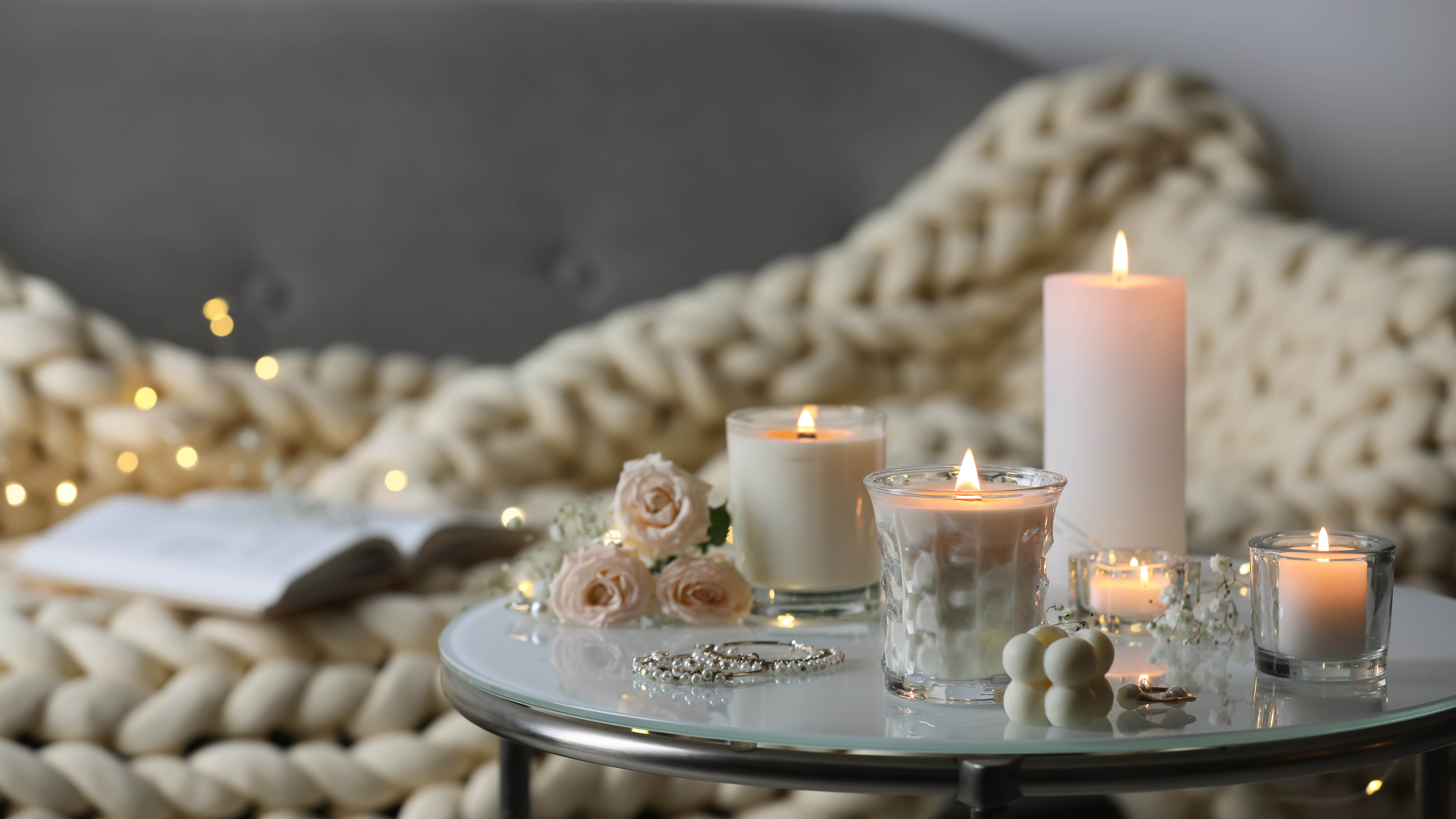 Candles on a glass table