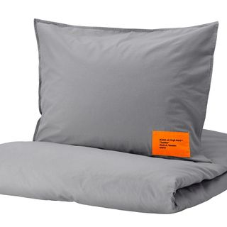 grey coloured bedding with white background