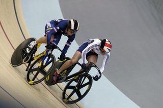 Virginie Cueff races with Britain's Victoria Williamson during the inauguration ceremony of the Saint-Quentin-en-Yvelines Velodrome