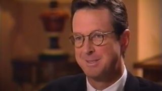 Michael Crichton smiles in conversation during an interview for ABC's Primetime.