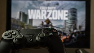 Playstation controller in front of Warzone