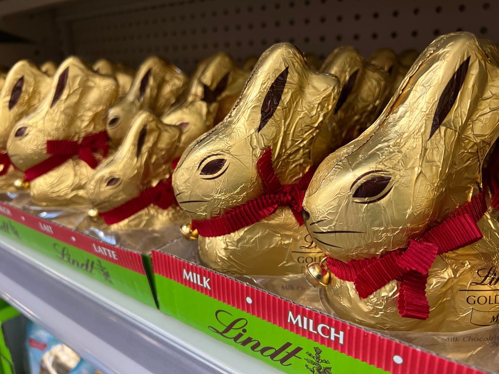 Lindt chocolate bunnies on the shelf in a supermarket.