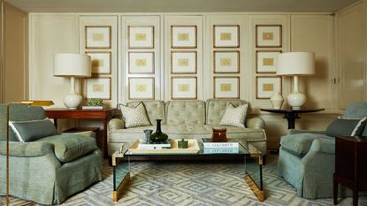 gallery wall in seating space with geometric rug