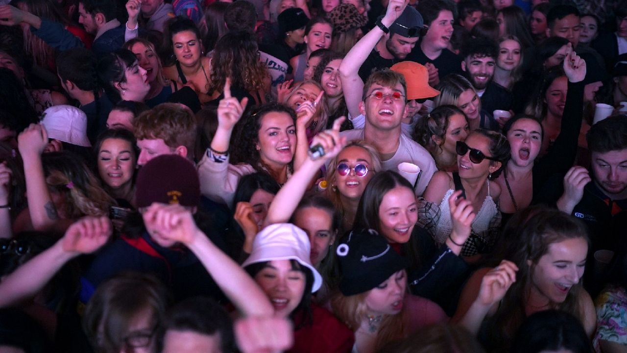 Concert-goers in a mosh pit