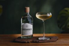 A bottle of vodka and Martini cocktail