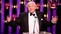 David Attenborough receiving award for Blue Planet II at the BAFTAs in 2018