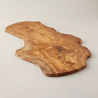 A brown olivewood chopping board